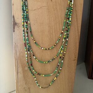 Green multi color strand set of four
